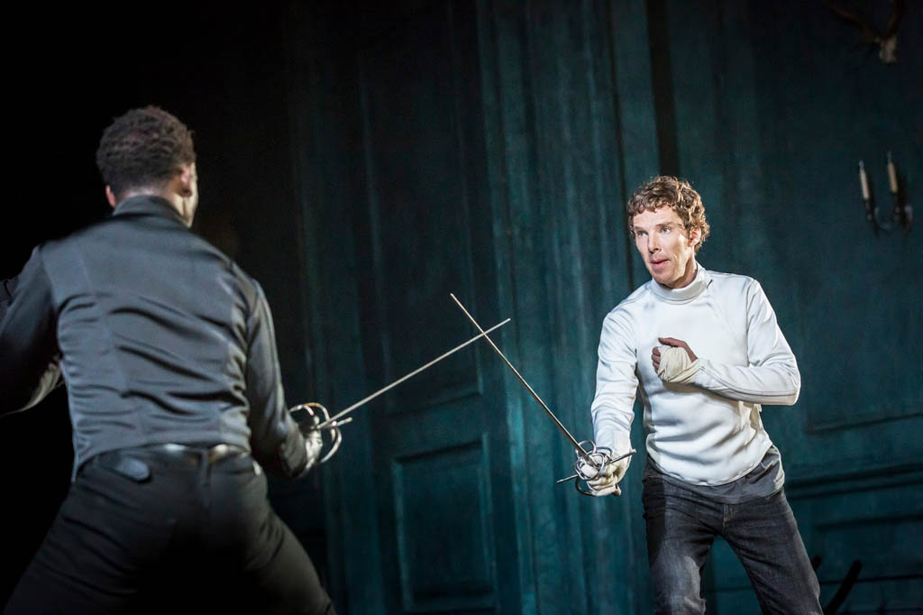 Benedict Cumberbatch as Hamlet at the Barbican Theatre in London. Here he's clasing with Kobna Holdbrook-Smith as Laertes. (Photo by Johan Persson)sword fighting